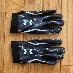 Under Armour black and white athletic football gloves